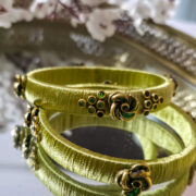 Pista green silk-thread kundan bangle pair
