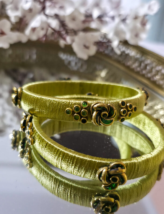 20250923_210714 Pista green silk-thread kundan bangle pair