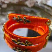 Orange silk-thread kundan bangle pair