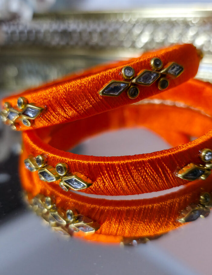 20250923_211210 Orange Silk Thread Kundan Bangles