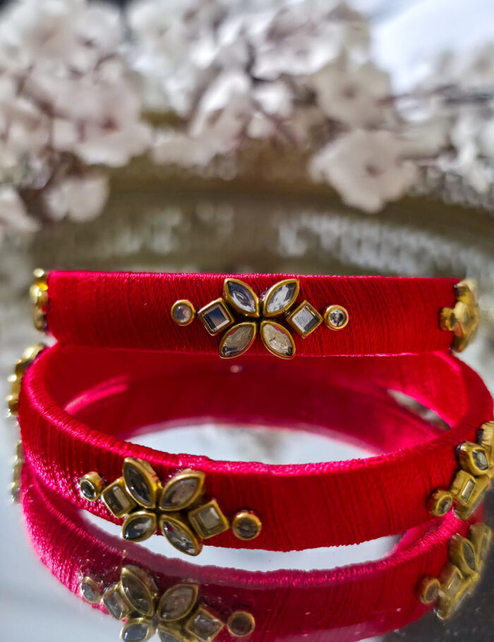 20250923_211612 Two silk-wrapped kundan bangles in mint green