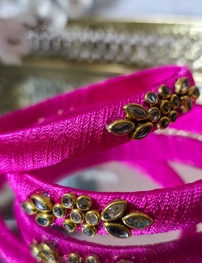 20250923_212058 Bright pink silk thread bangles decorated with kundan and stones