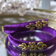 Pair of purple silk-thread bangles with kundan work