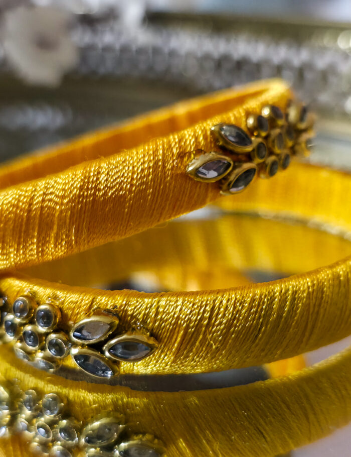 20250923_212223 Yellow silk thread kundan bangles set of 2