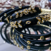Silk-wrapped kundan bangles in black thread