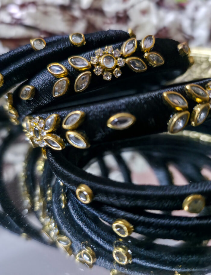 Silk-wrapped kundan bangles in black thread