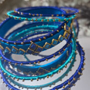 Elegant bangle set of 7 in navy and sky-blue silk thread