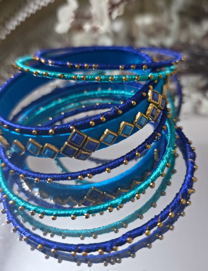 Elegant bangle set of 7 in navy and sky-blue silk thread