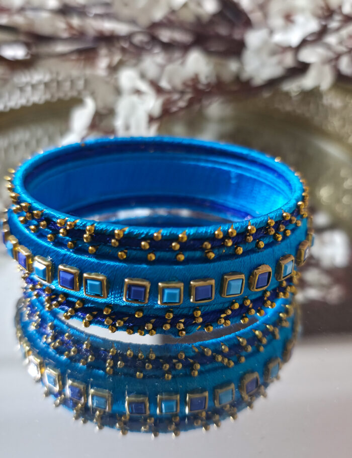 Traditional silk thread bangles in navy and light blue (7 pieces)