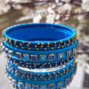 Silk-wrapped bangles in navy and sky blue, set of 7