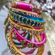 Pink and turquoise silk thread kundan bangles
