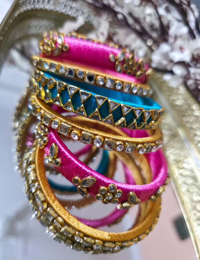 Pink and turquoise silk thread kundan bangles