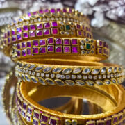 Silk-wrapped kundan bangles in gold and pink
