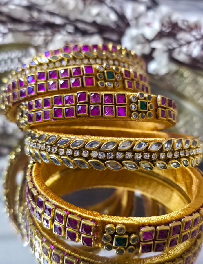 20250927_224348 Silk-wrapped kundan bangles in gold and pink