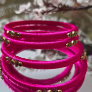 Twin kundan bangles covered in silk thread
