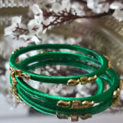Elegant pair of silk-wrapped kundan bangles