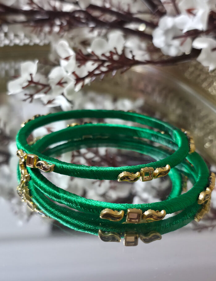 20250927_225447 Elegant pair of silk-wrapped kundan bangles