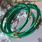 Matching pair of silk-thread kundan bangles