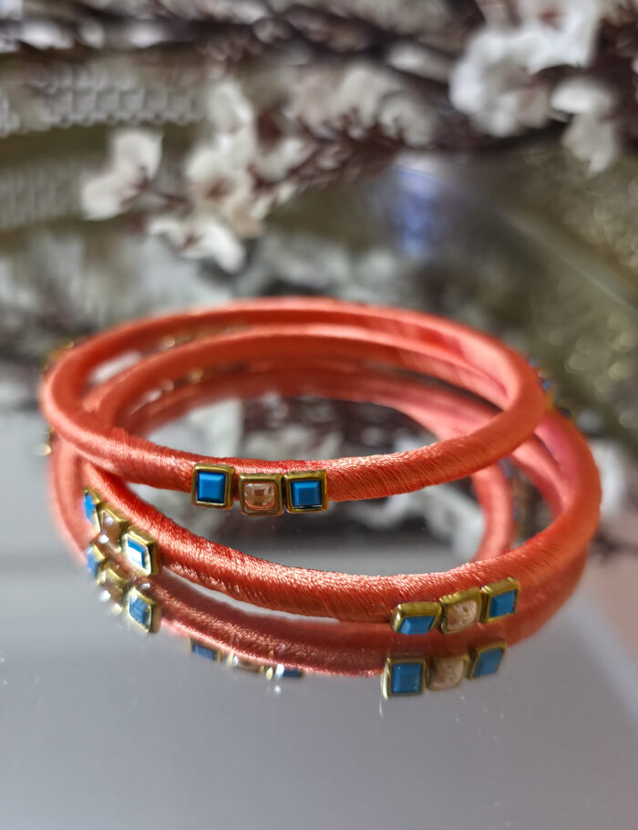 20250927_225551 Two handcrafted silk-thread bangles with kundan stones