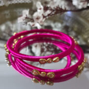 Lightweight kundan bangles wrapped in silk thread