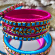 Silk-wrapped kundan bangles in blue and pink