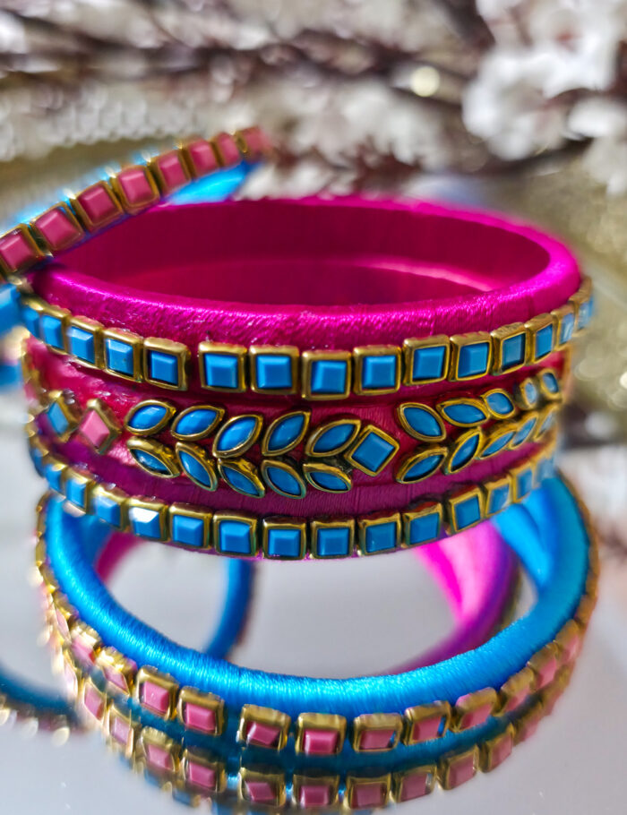 20250927_230205 Silk-wrapped kundan bangles in blue and pink