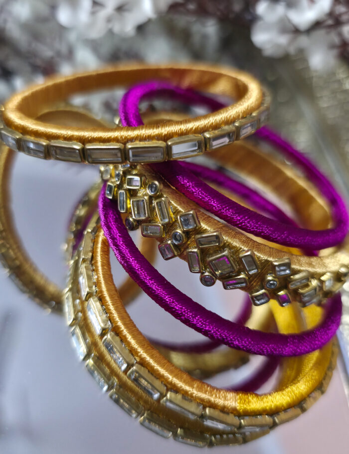 20251002_234658 Silk thread kundan bangle set in gold and fuchsia