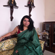 Green silk saree with Katan weave — rich shine and weave detail