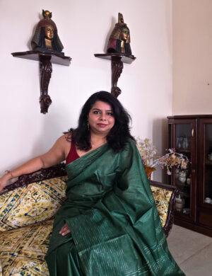 Green silk saree with Katan weave — rich shine and weave detail