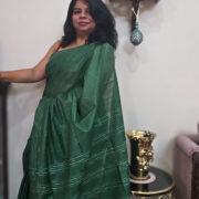 Green handwoven Katan silk saree with rich texture