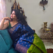 Deep blue handloom cotton saree with green pallu and zari border