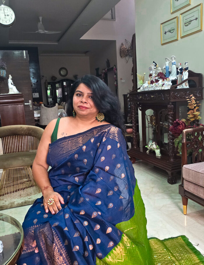 20251021_145623 Blue cotton saree with vibrant green pallu and zari accent
