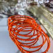 Silk-wrapped metal bangles set for wedding or festival
