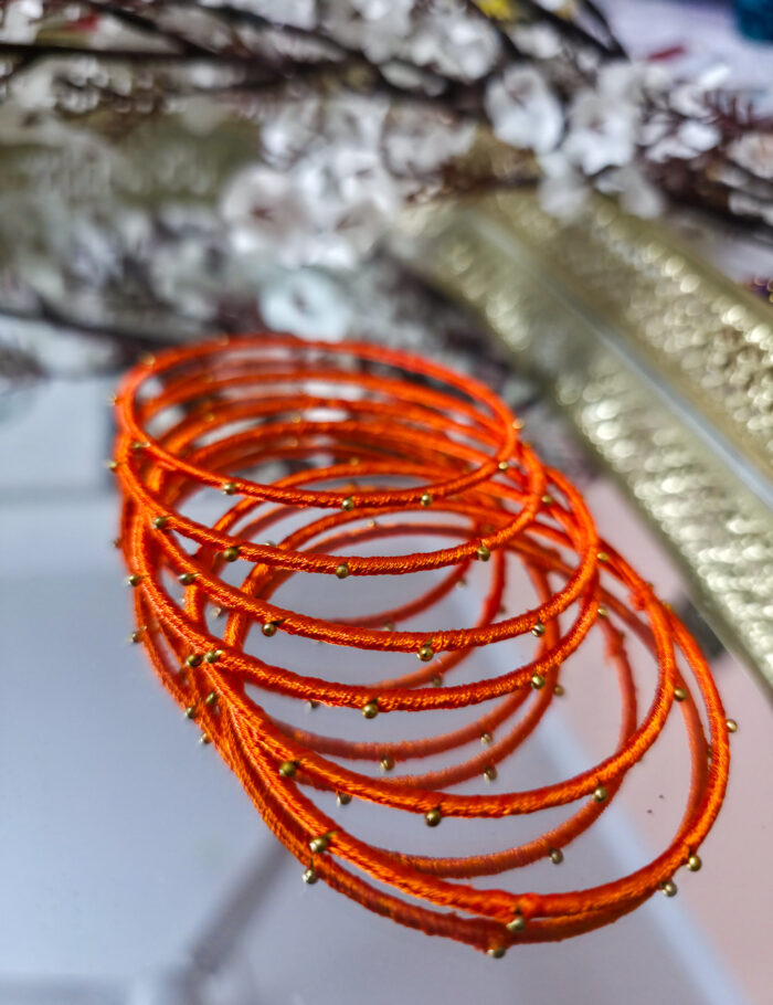 20251028_232640 Silk-wrapped metal bangles set for wedding or festival