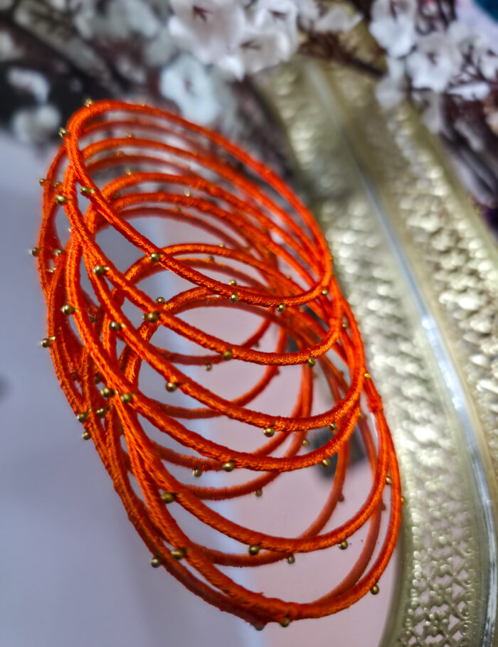 20251028_232642 Traditional festive bangle set — 4 silk thread metal bangles