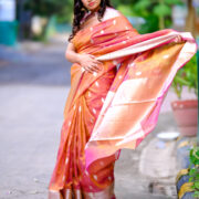 Banarasi silk drape with an ornate zari border and rich texture.