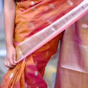 Silk saree woven in Banaras with decorative zari border designing.